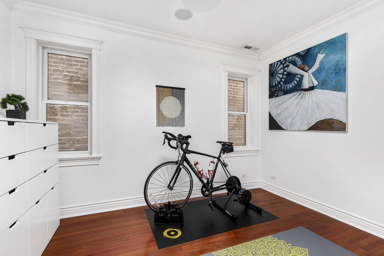 902 West Roscoe Street, Unit 2 Chicago, IL 60657 - Photo 12 of 14 a view of a room with gym equipment