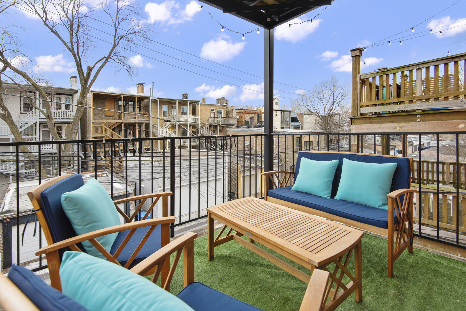 902 West Roscoe Street, Unit 2 Chicago, IL 60657 - Photo 14 of 14 a view of a balcony with furniture