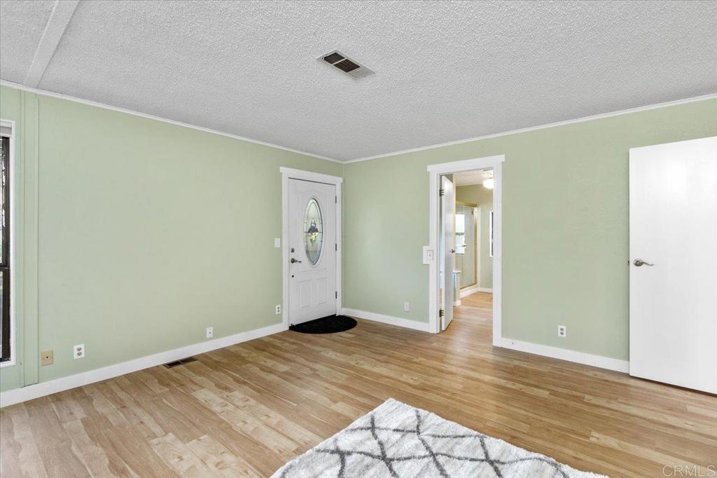 18218 Paradise Mountain Road, Unit SPC 206 Valley Center, CA 92082 - Photo 21 of 43 a view of an empty room and window