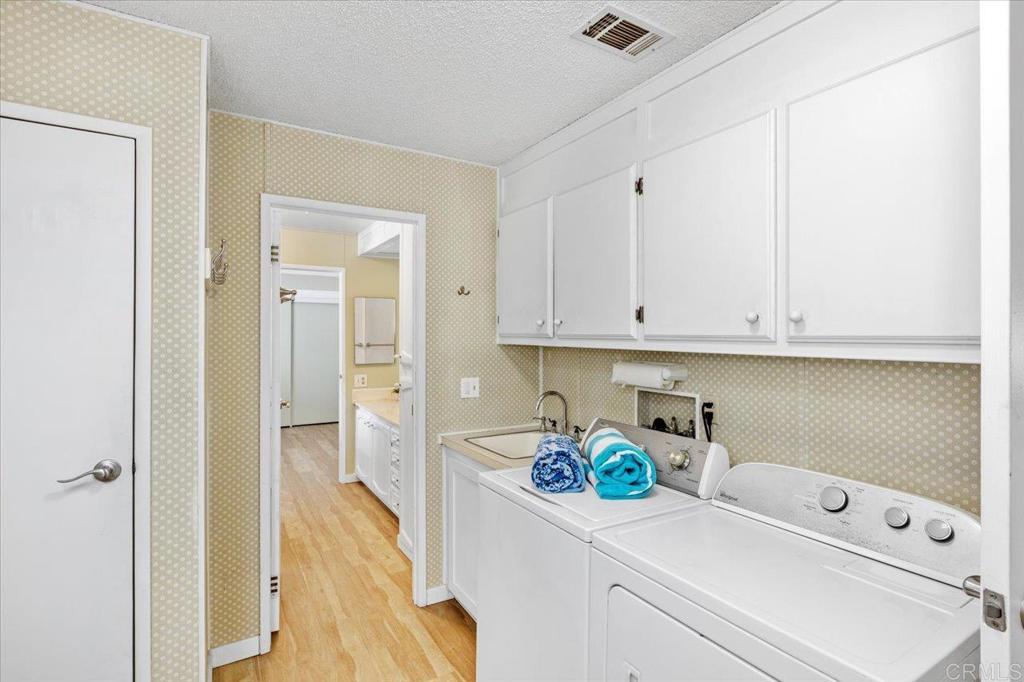 18218 Paradise Mountain Road, Unit SPC 206 Valley Center, CA 92082 - Photo 26 of 43 a room with storage and utility