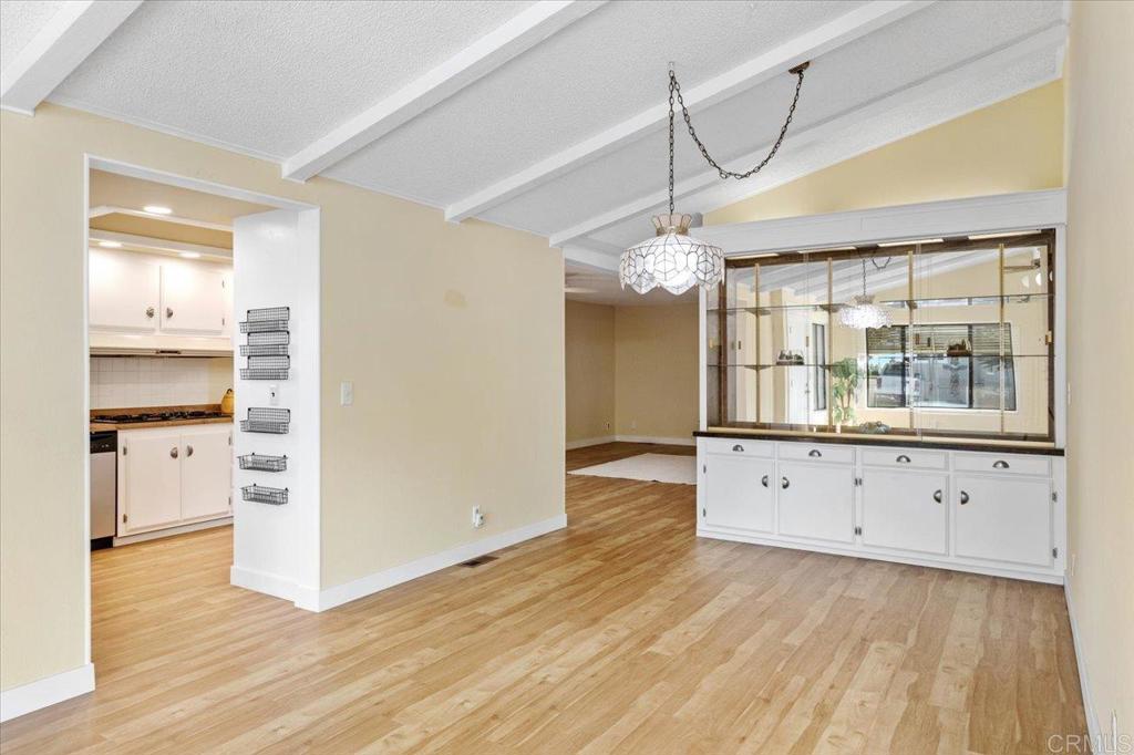 18218 Paradise Mountain Road, Unit SPC 206 Valley Center, CA 92082 - Photo 8 of 43 a view of a kitchen with cabinet and a window