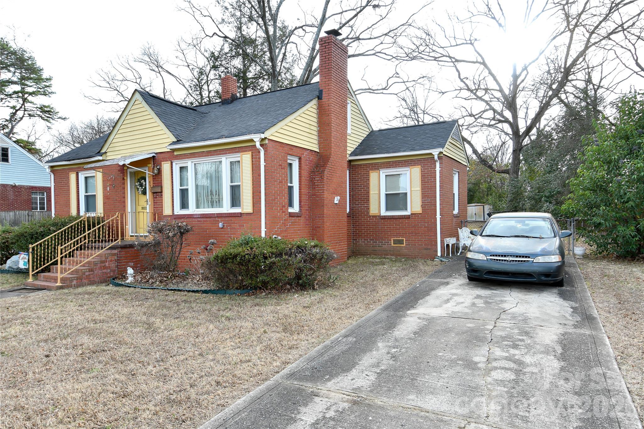 531 Bowman Road Charlotte, NC 28217 - Photo 2 of 10 a car parked in front of a house