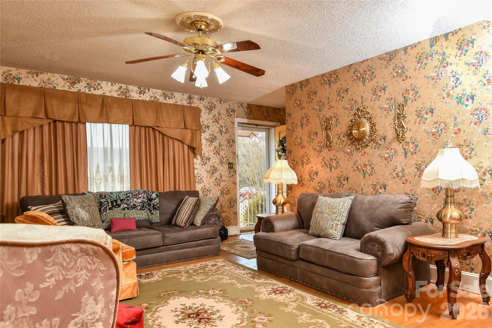 531 Bowman Road Charlotte, NC 28217 - Photo 7 of 10 a living room with furniture and a large window