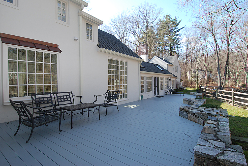 449 Valley Road New Canaan, CT 06840 - Photo 3 of 19 a view of a house with backyard and sitting area