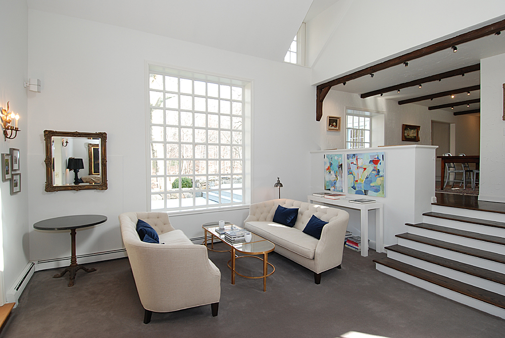 449 Valley Road New Canaan, CT 06840 - Photo 7 of 19 a living room with furniture and a window