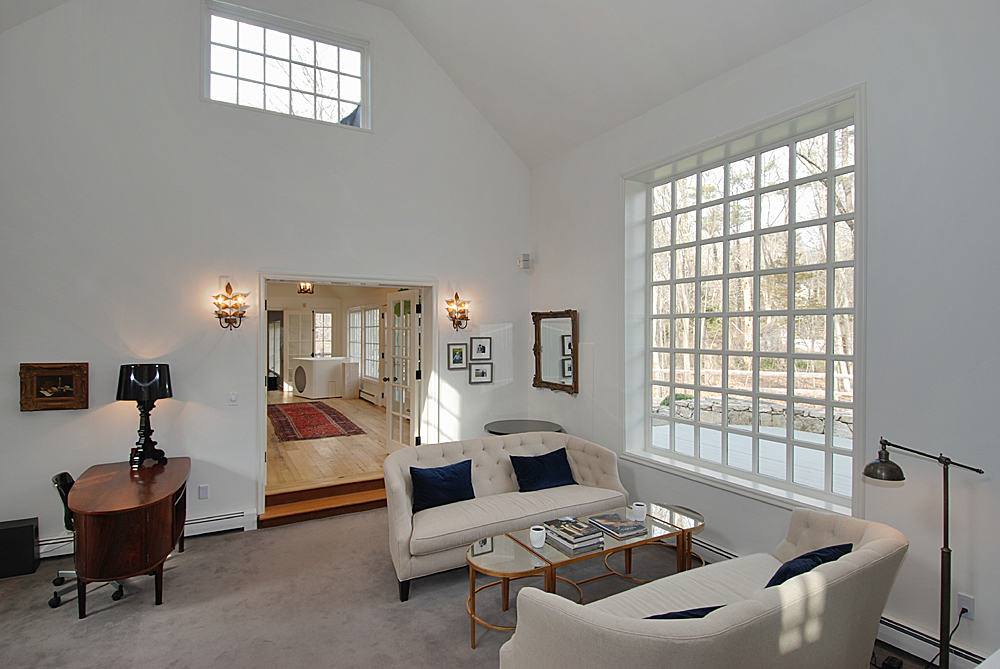 449 Valley Road New Canaan, CT 06840 - Photo 8 of 19 a living room with furniture and a large window
