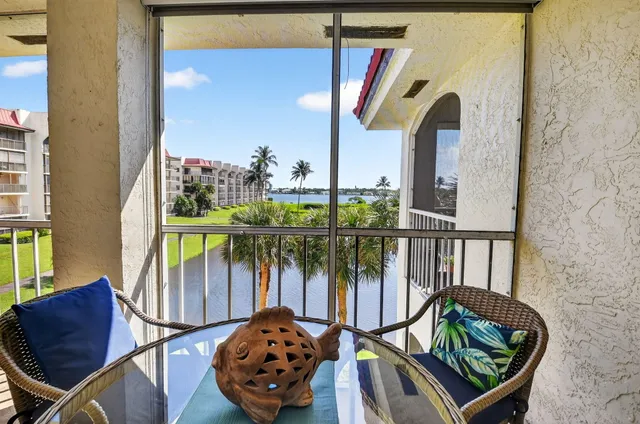 a kitchen with stainless steel appliances granite countertop counter space a sink and cabinets