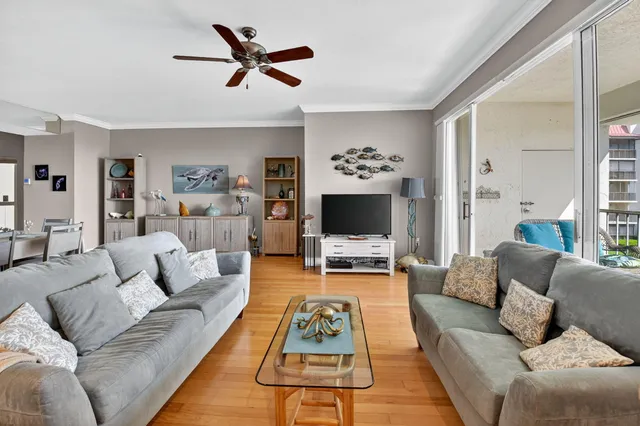 a kitchen with granite countertop a refrigerator and a sink