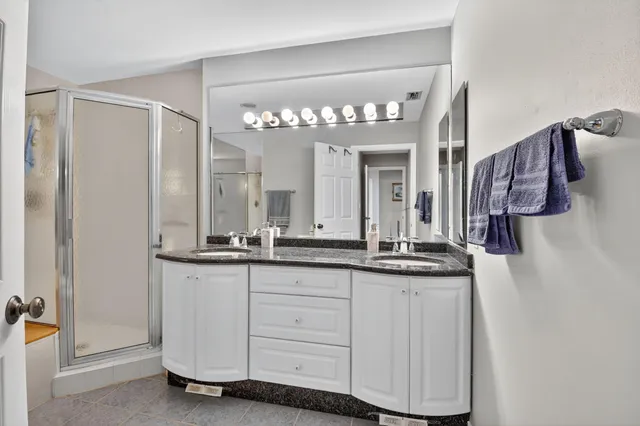 a view of multiple houses with a yard