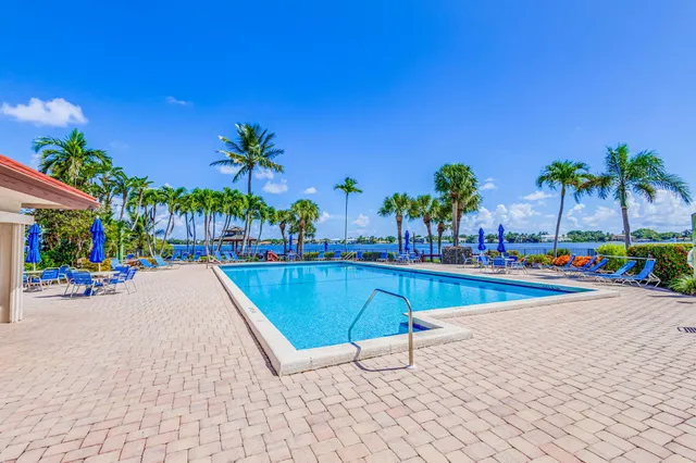 a view of an empty room with a small yard