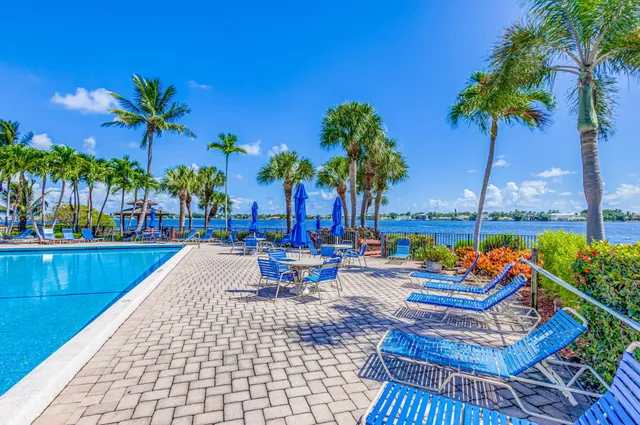 a outdoor space with lots of furniture and lots of wooden furniture