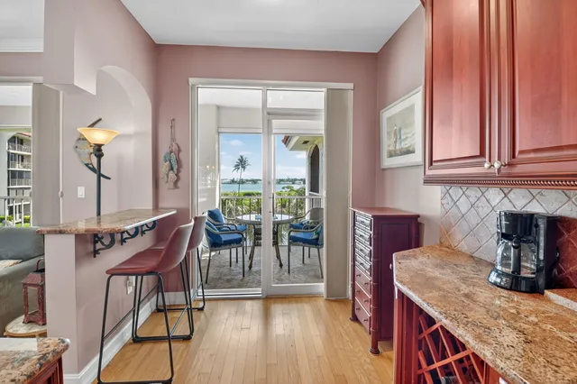 a view of balcony with furniture