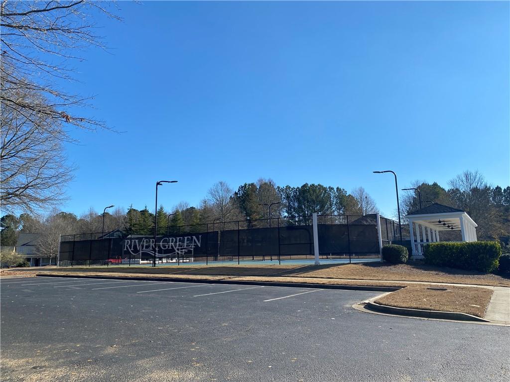 405 Trumpet Circle Canton, GA 30114 - Photo 6 of 10 a view of a swimming pool with a yard