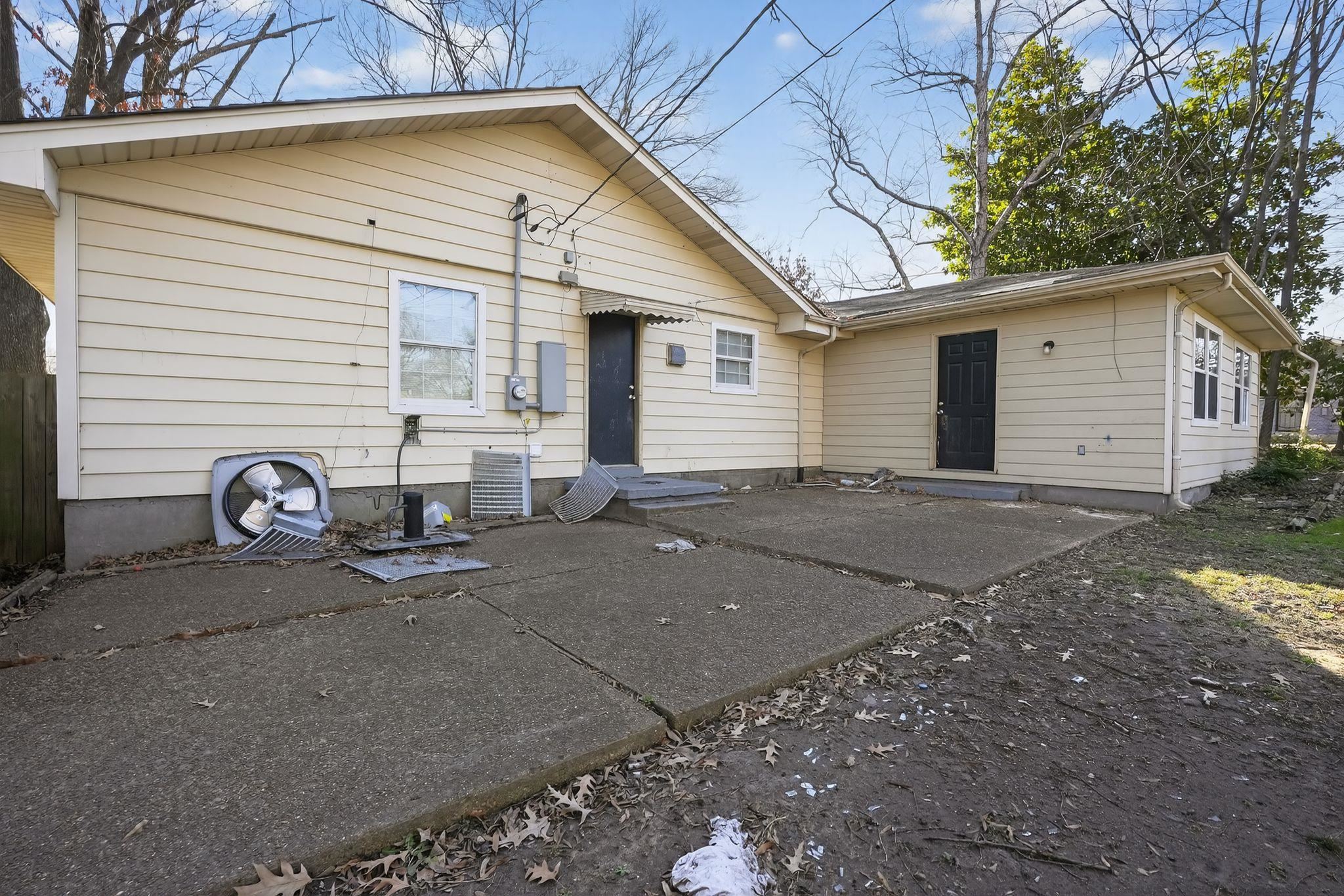 4828 Knight Arnold Road Memphis, TN 38118 - Photo 21 of 24 Back of property featuring a patio area