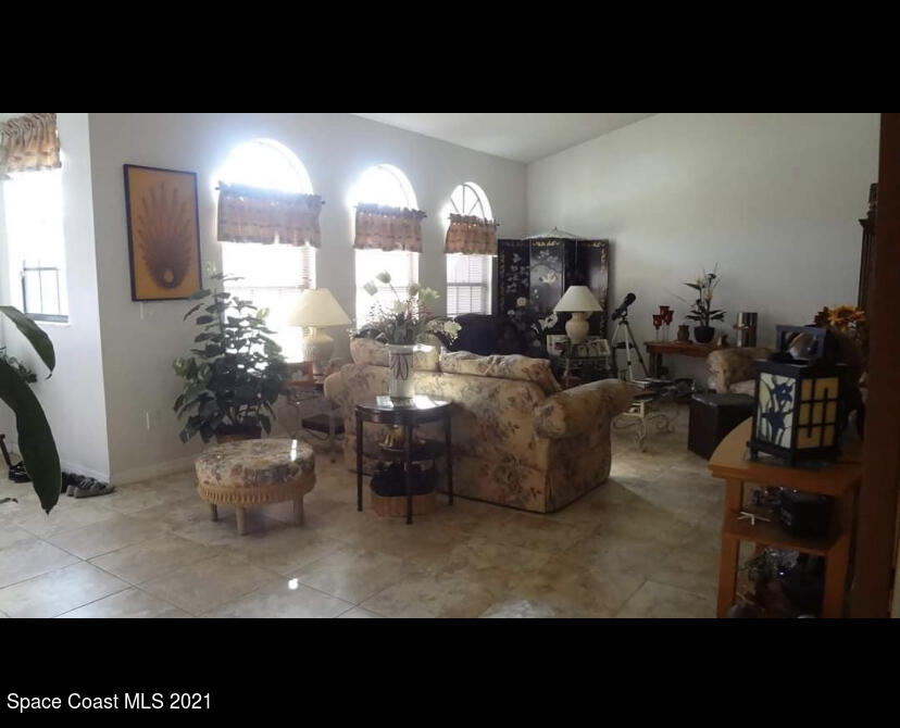 714 Seymour Road Northeast Palm Bay, FL 32905 - Photo 5 of 5 a view of living room and dining room
