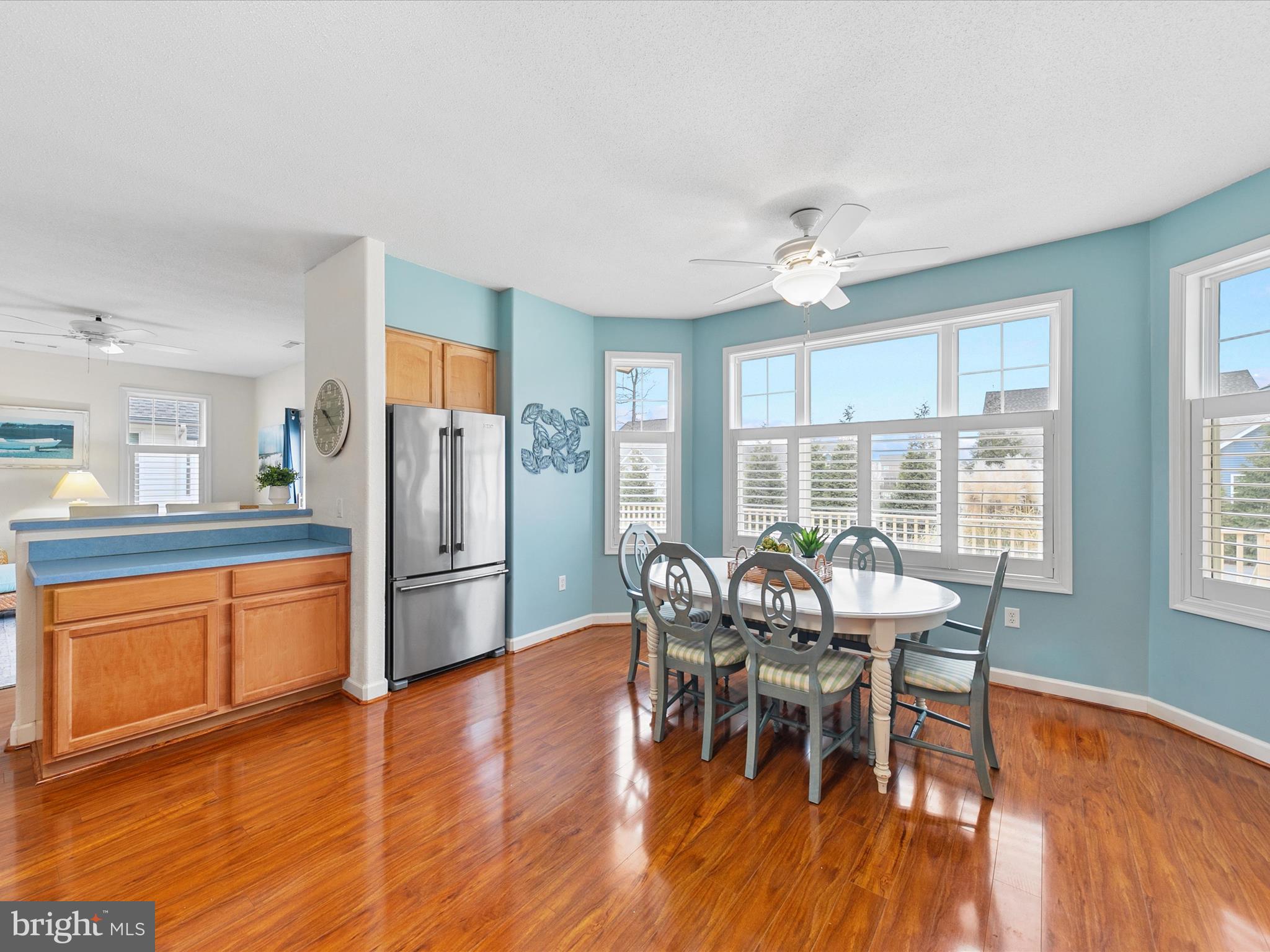 4 Cromwell Drive Ocean View, DE 19970 - Photo 17 of 59 a dining room with furniture a chandelier and wooden floor
