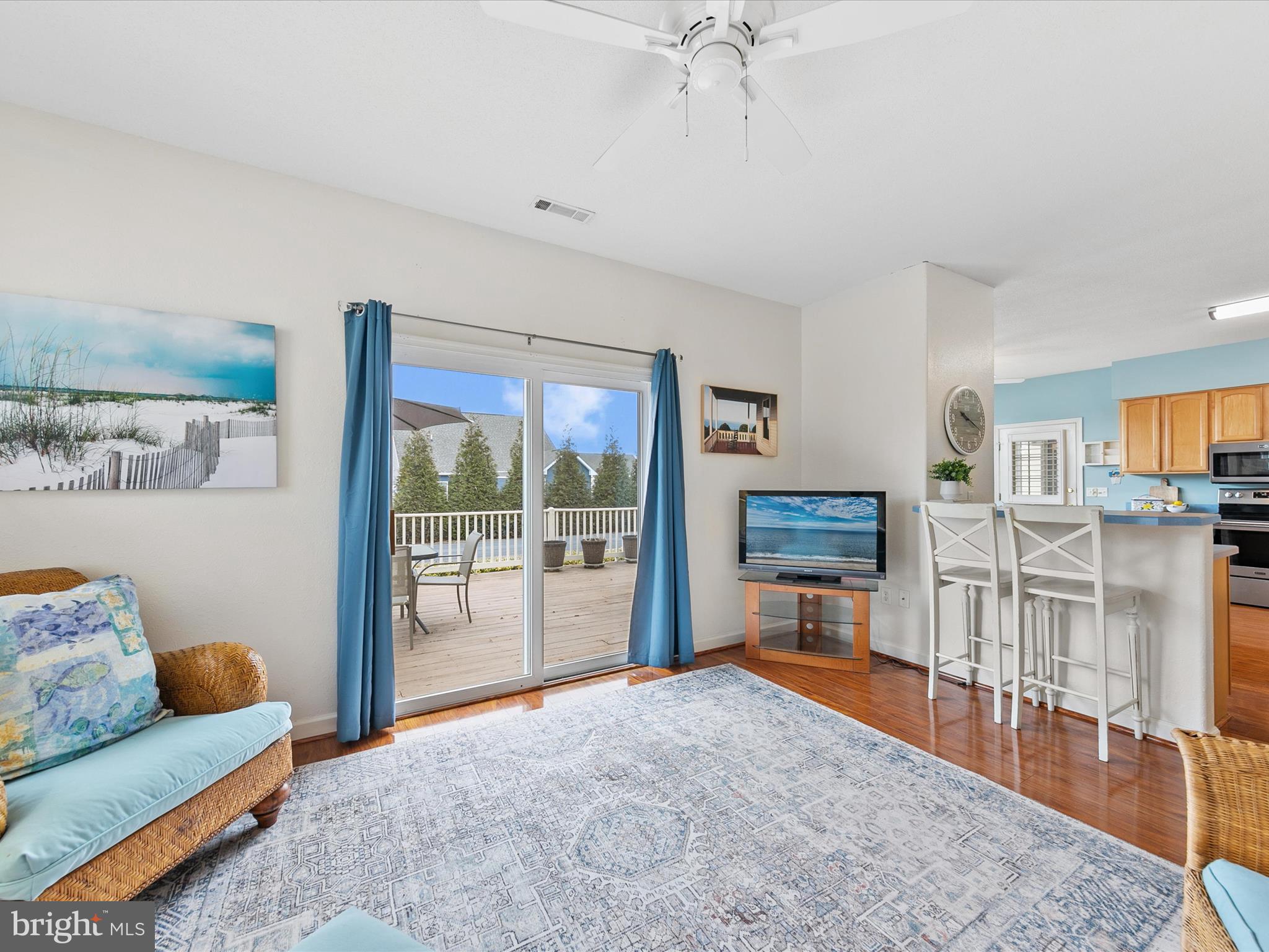 4 Cromwell Drive Ocean View, DE 19970 - Photo 20 of 59 a living room with furniture a fireplace and a flat screen tv