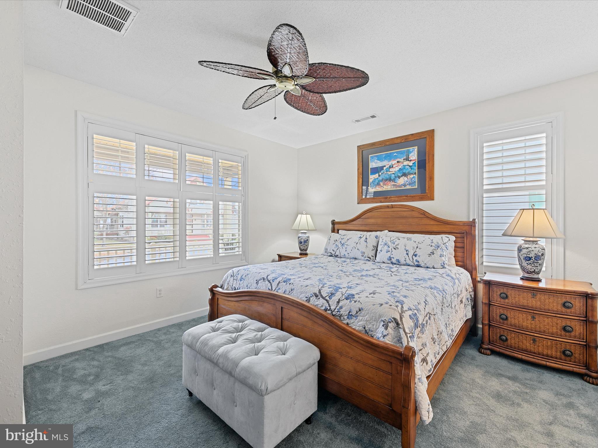 4 Cromwell Drive Ocean View, DE 19970 - Photo 24 of 59 a bedroom with a bed and a chandelier