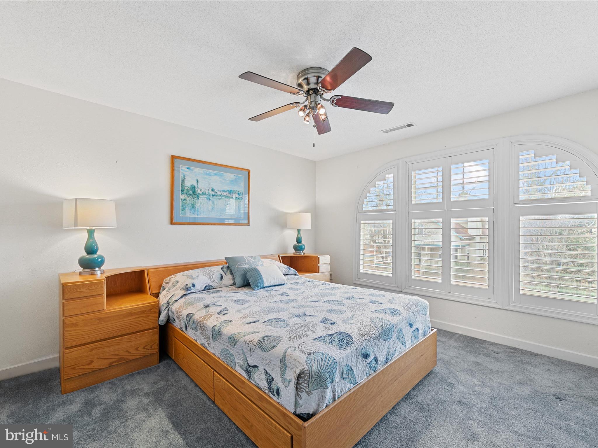 4 Cromwell Drive Ocean View, DE 19970 - Photo 32 of 59 a bedroom with a large bed and a window