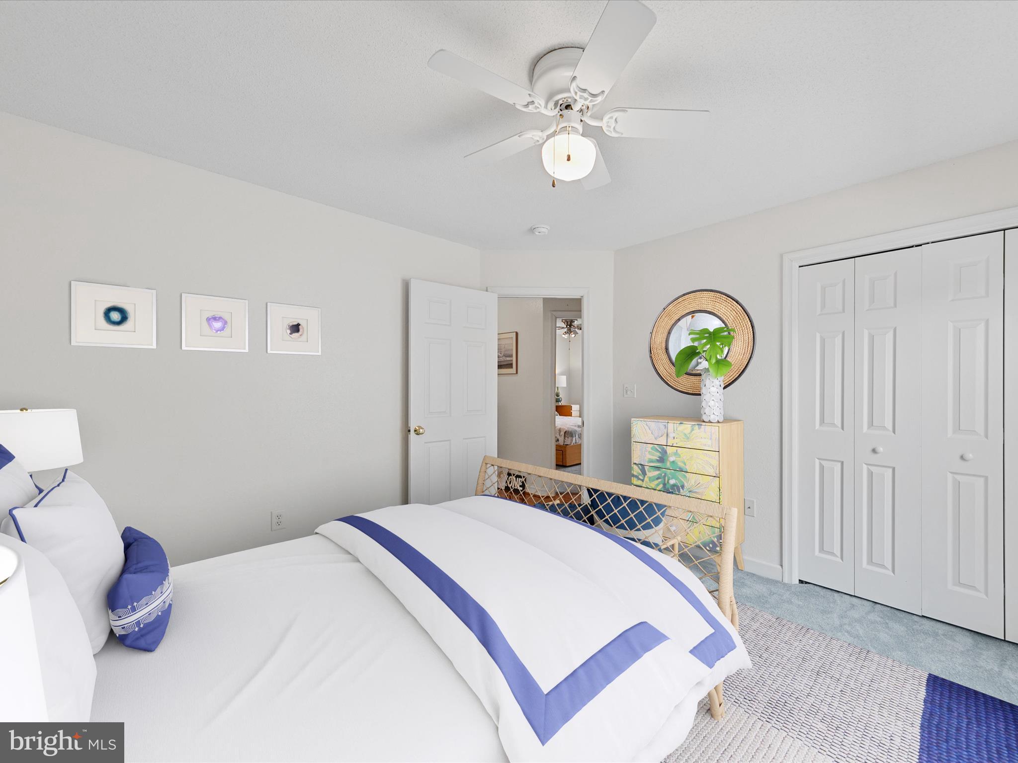 4 Cromwell Drive Ocean View, DE 19970 - Photo 36 of 59 a bedroom with a bed and painting on the wall