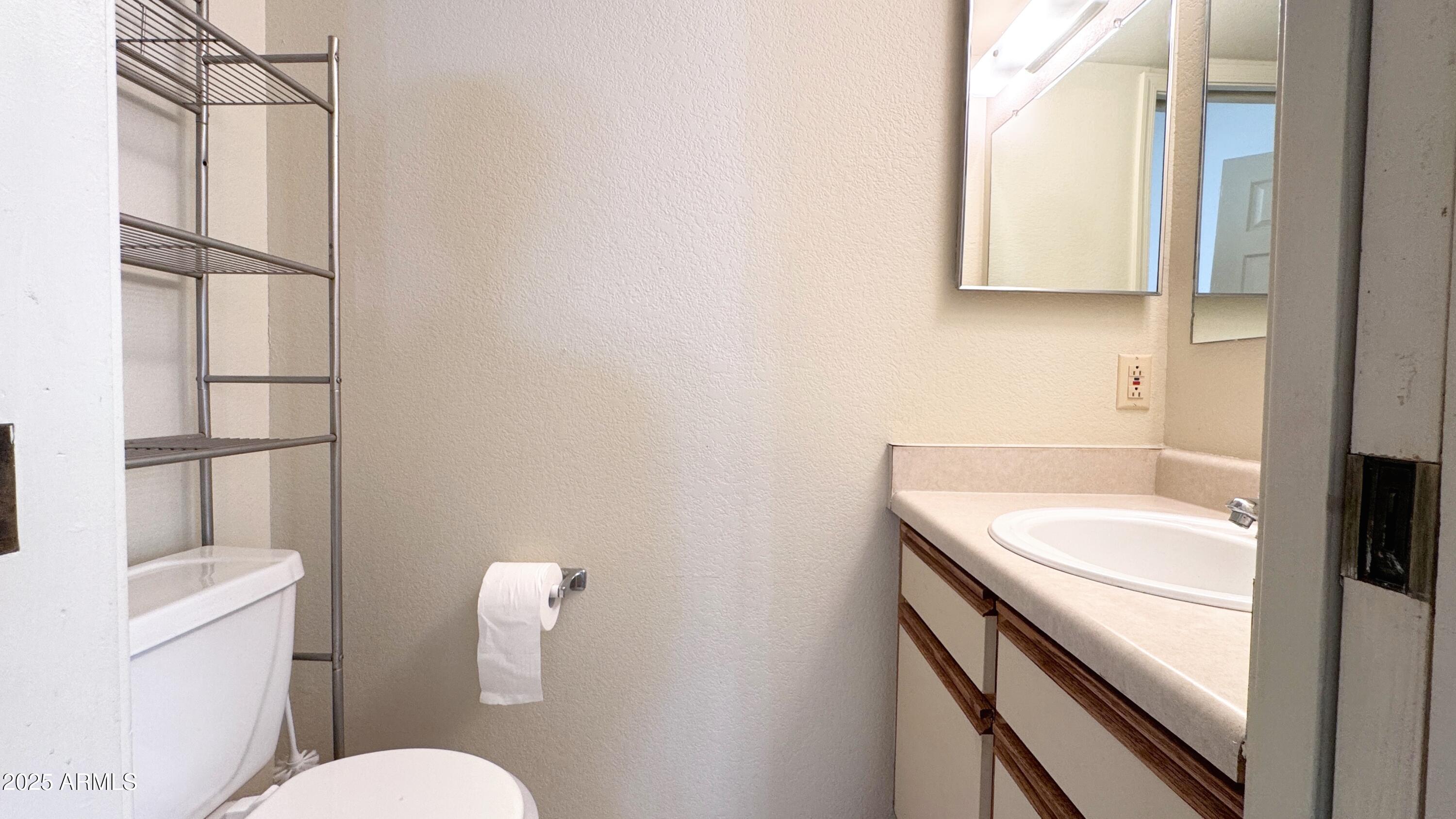 1440 North Idaho Road, Unit 1008 Apache Junction, AZ 85119 - Photo 16 of 28 Half Bath in Primary Bedroom