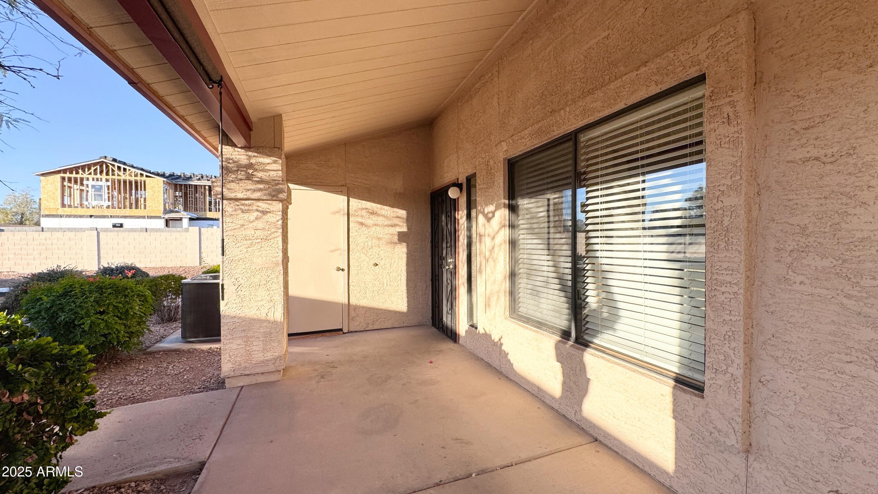 1440 North Idaho Road, Unit 1008 Apache Junction, AZ 85119 - Photo 2 of 28 Front covered patio