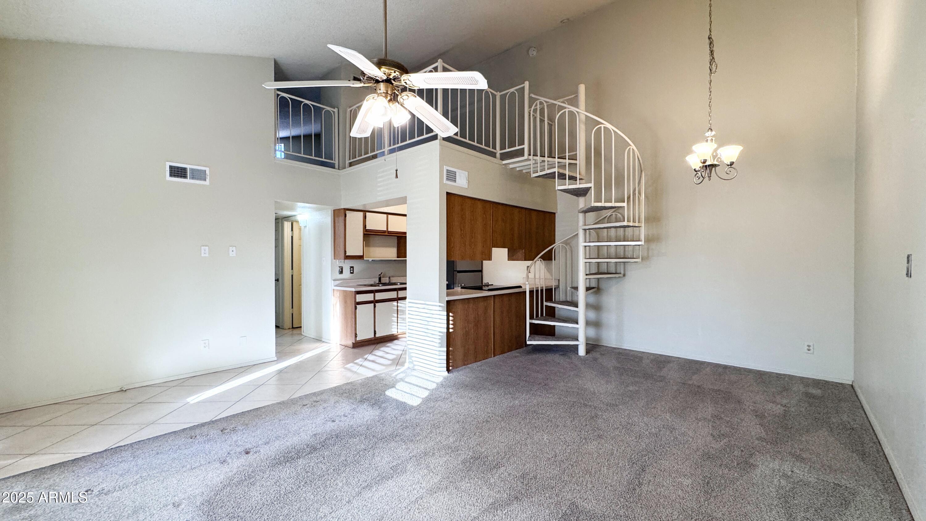 1440 North Idaho Road, Unit 1008 Apache Junction, AZ 85119 - Photo 4 of 28 Great Room & Kitchen