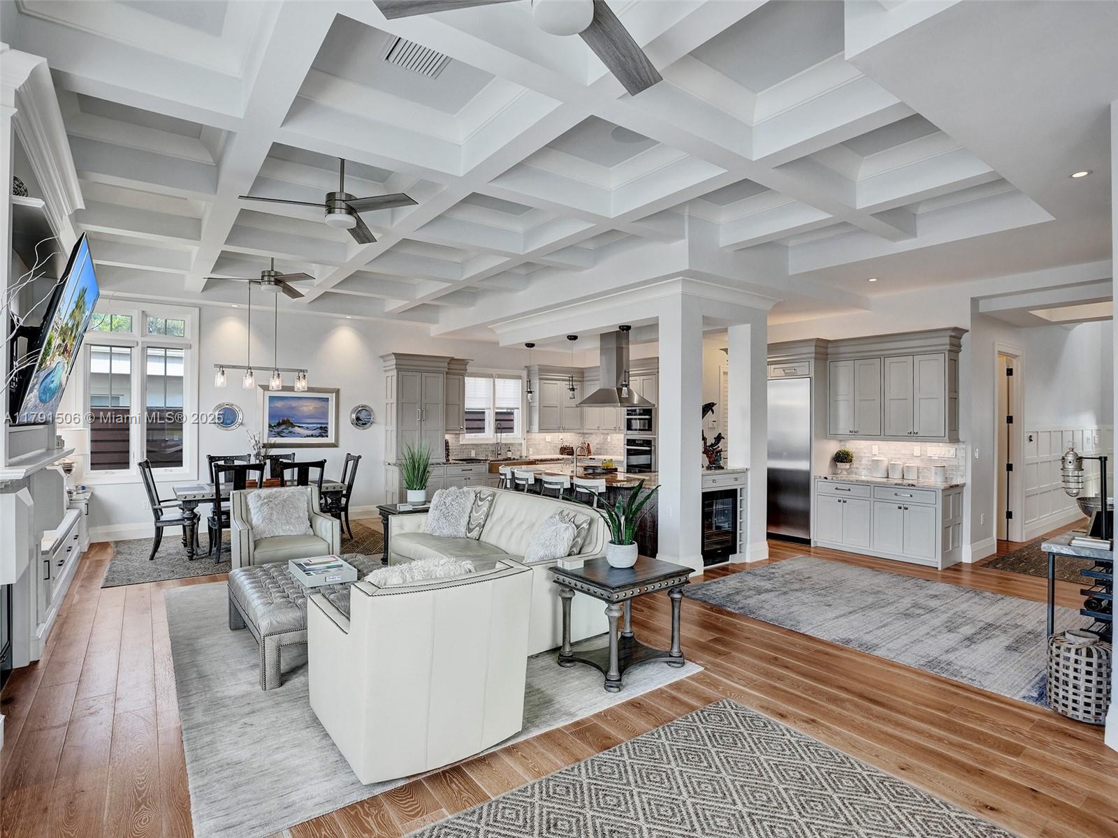 2340 Northeast 48th Street Lighthouse Point, FL 33064 - Photo 14 of 48 a living room with lots of furniture and view of kitchen appliances