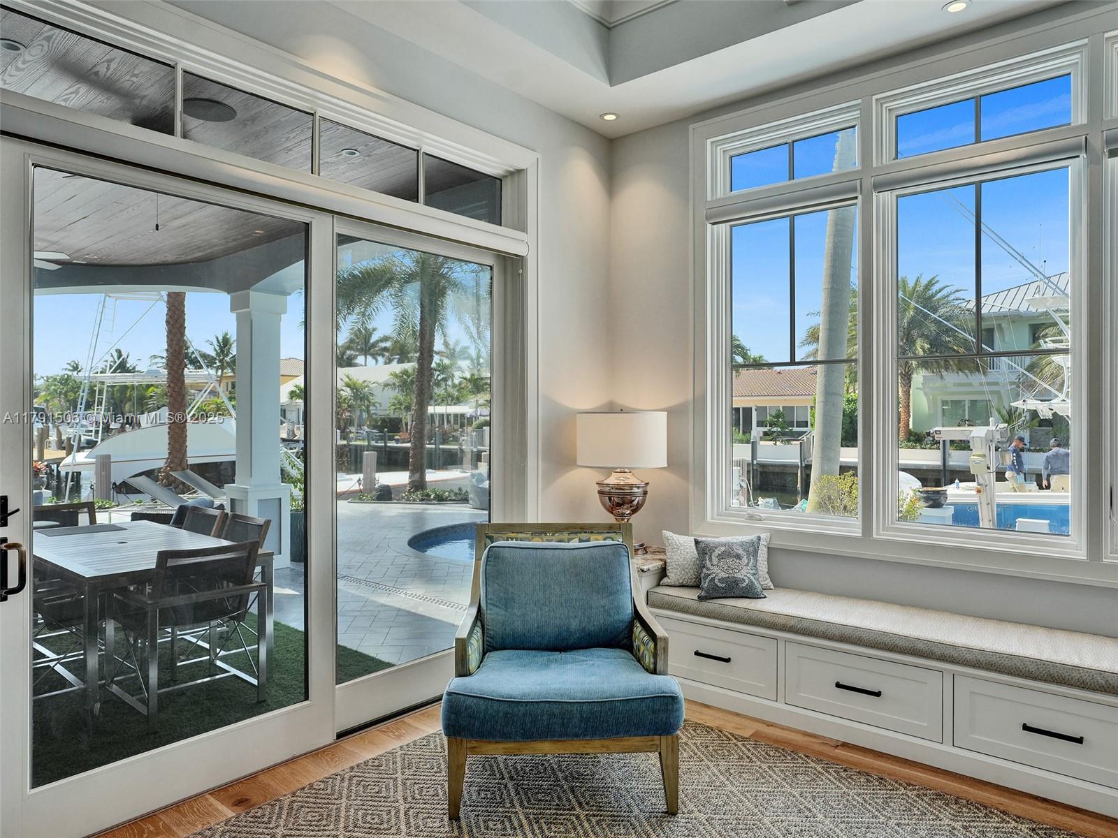 2340 Northeast 48th Street Lighthouse Point, FL 33064 - Photo 18 of 48 a living room with furniture and a large window