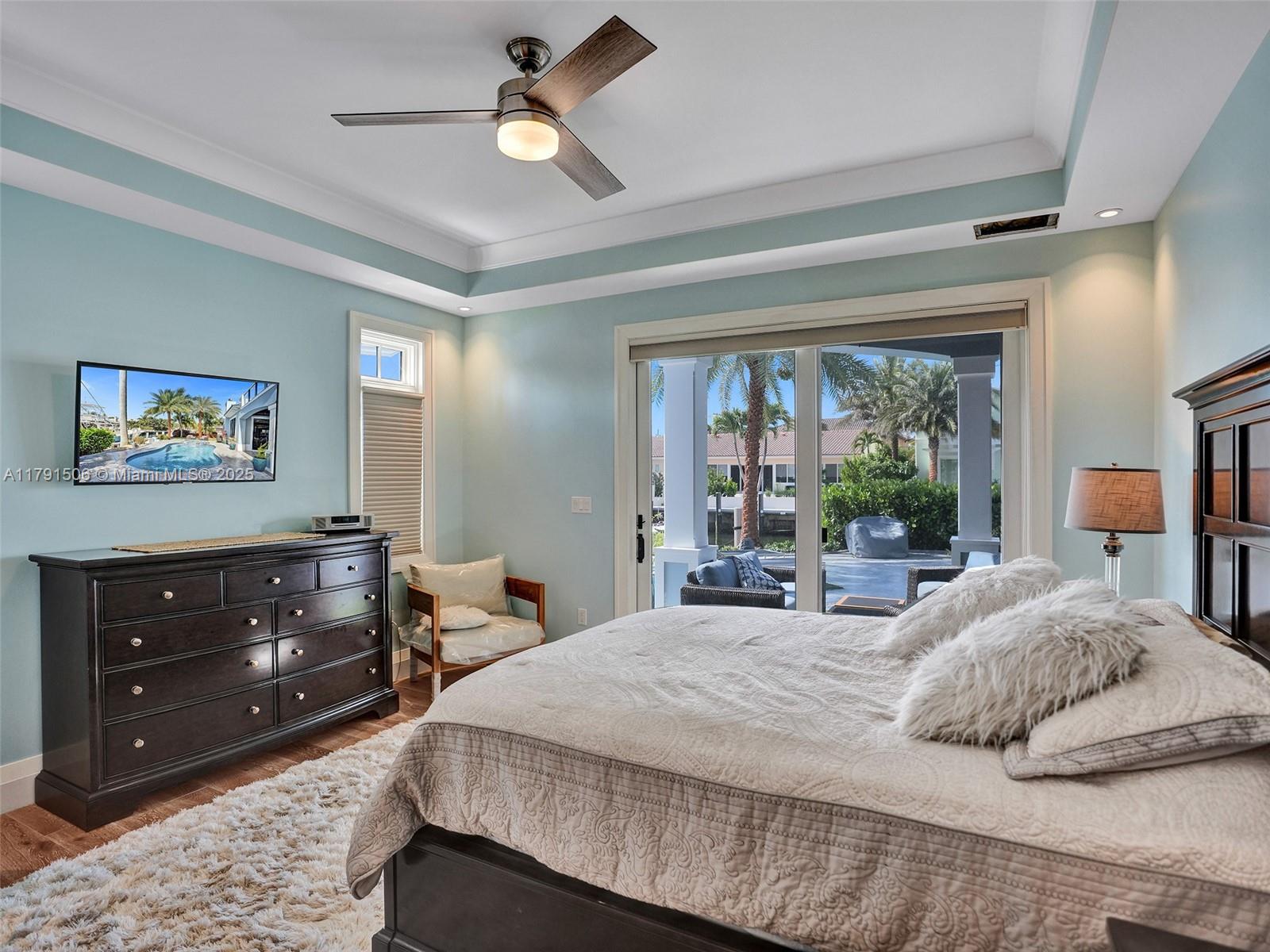 2340 Northeast 48th Street Lighthouse Point, FL 33064 - Photo 19 of 48 a bedroom with a bed and a dresser