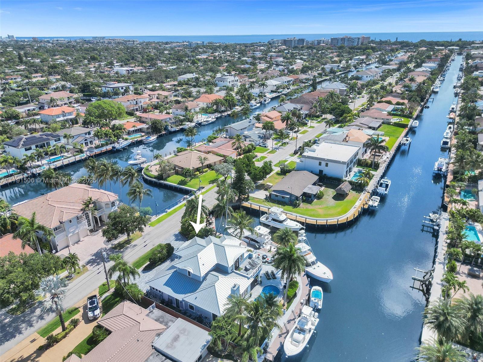 2340 Northeast 48th Street Lighthouse Point, FL 33064 - Photo 3 of 48 an aerial view of residential houses with outdoor space