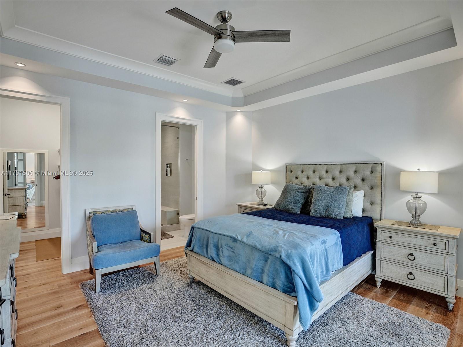 2340 Northeast 48th Street Lighthouse Point, FL 33064 - Photo 31 of 48 a bedroom with a bed and a couch