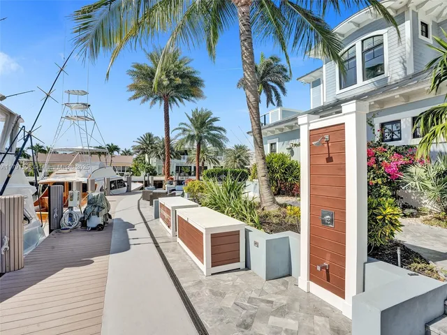 a city street lined with buildings and trees