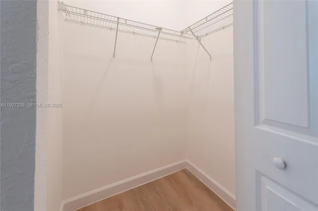 a view of a room with racks on the wall