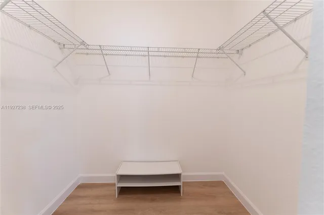 a view of a room with racks on the wall