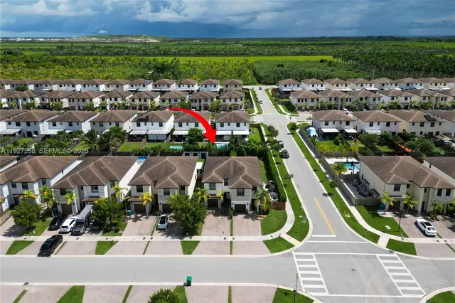 an aerial view of multiple house