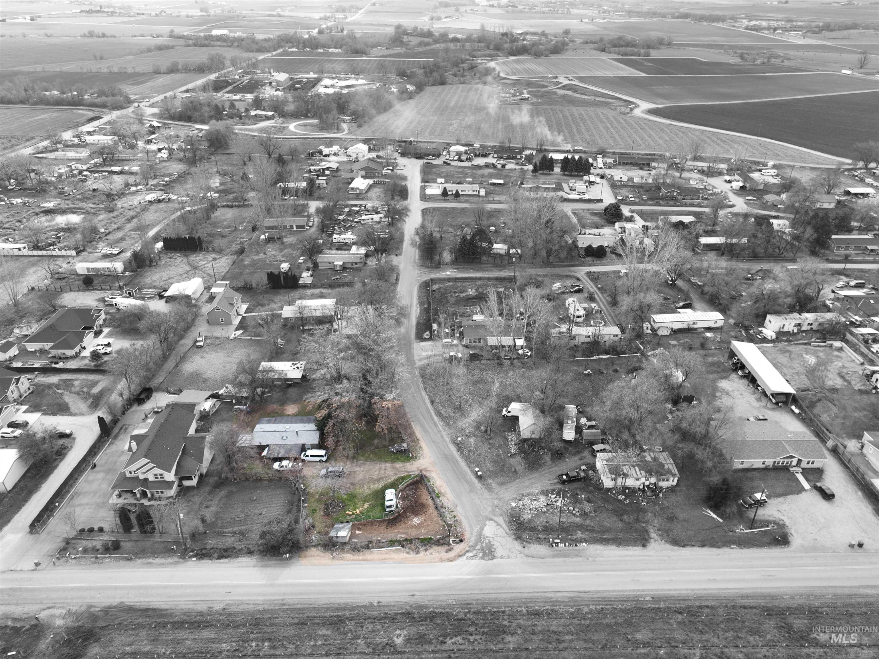 19151 Symms Road Caldwell, ID 83607 - Photo 4 of 14 Aerial view of sparsely populated area with large plots for crops