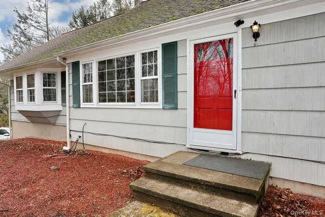 a front view of a house with a garage