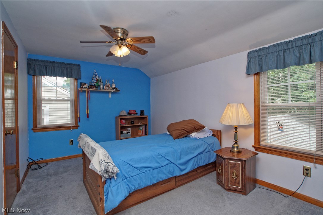 1273 Ford Road Lyndhurst, OH 44124 - Photo 18 of 32 3rd bedroom with lighted ceiling fan and hardwood under carpet.