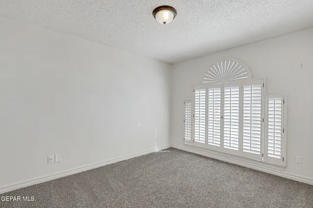 a bathroom with a double vanity sink a mirror and with