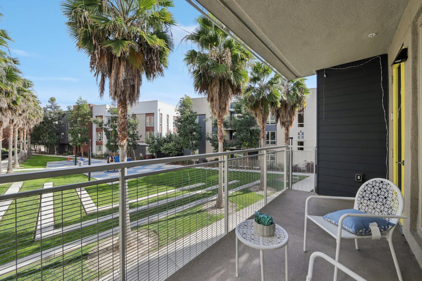 390 Riesling Avenue, Unit 21 Milpitas, CA 95035 - Photo 22 of 48 a view of a swimming pool with a lounge chair