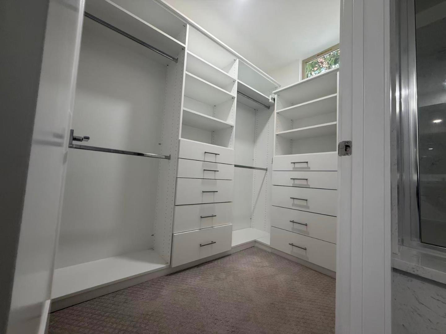 390 Riesling Avenue, Unit 21 Milpitas, CA 95035 - Photo 31 of 48 a view of walk in closet with empty racks