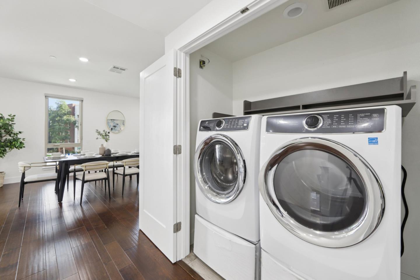390 Riesling Avenue, Unit 21 Milpitas, CA 95035 - Photo 32 of 48 a view of a hallway with washer and dryer