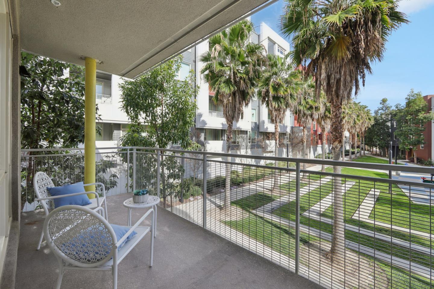 390 Riesling Avenue, Unit 21 Milpitas, CA 95035 - Photo 37 of 48 a view of a swimming pool with a patio and a garden