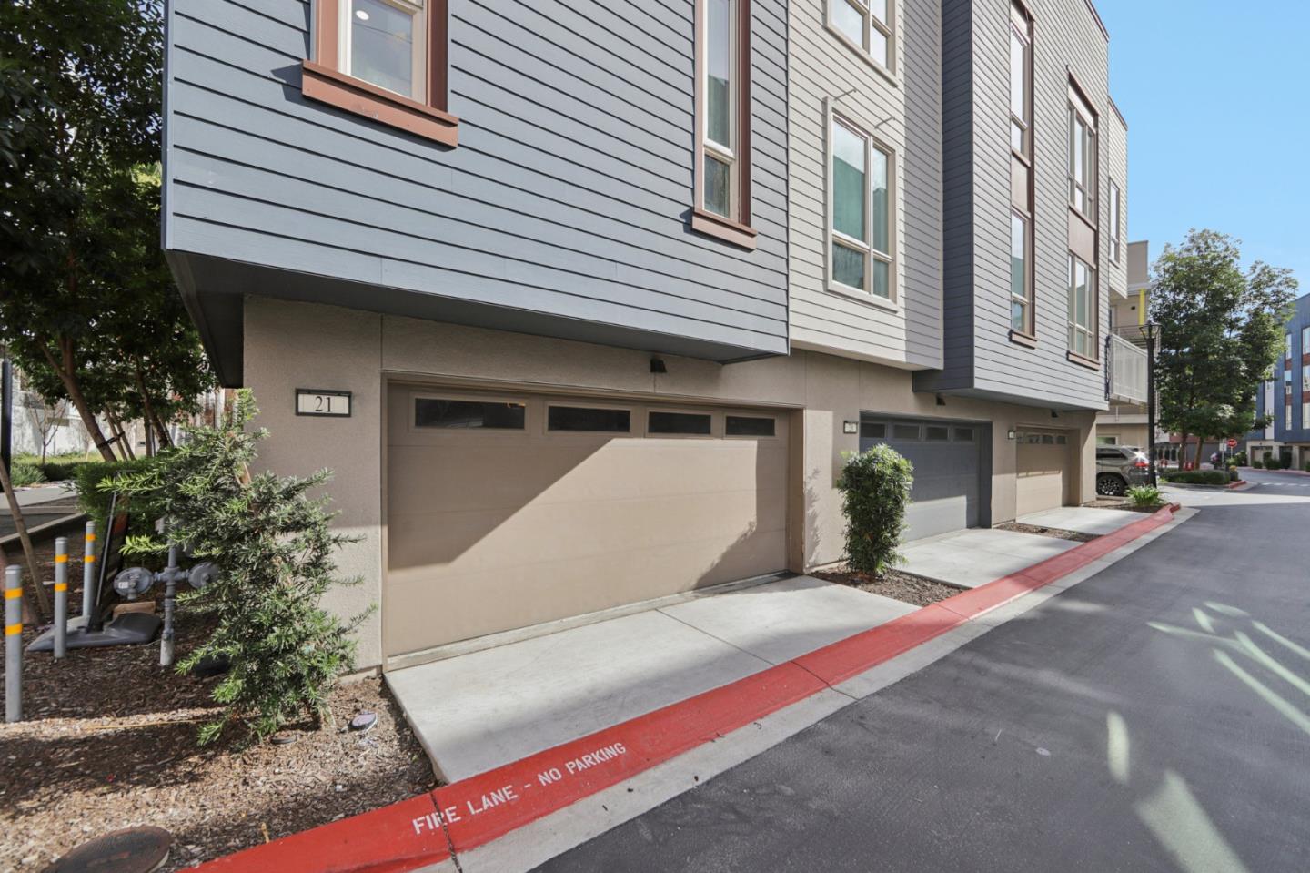 390 Riesling Avenue, Unit 21 Milpitas, CA 95035 - Photo 39 of 48 a front view of a house with garage