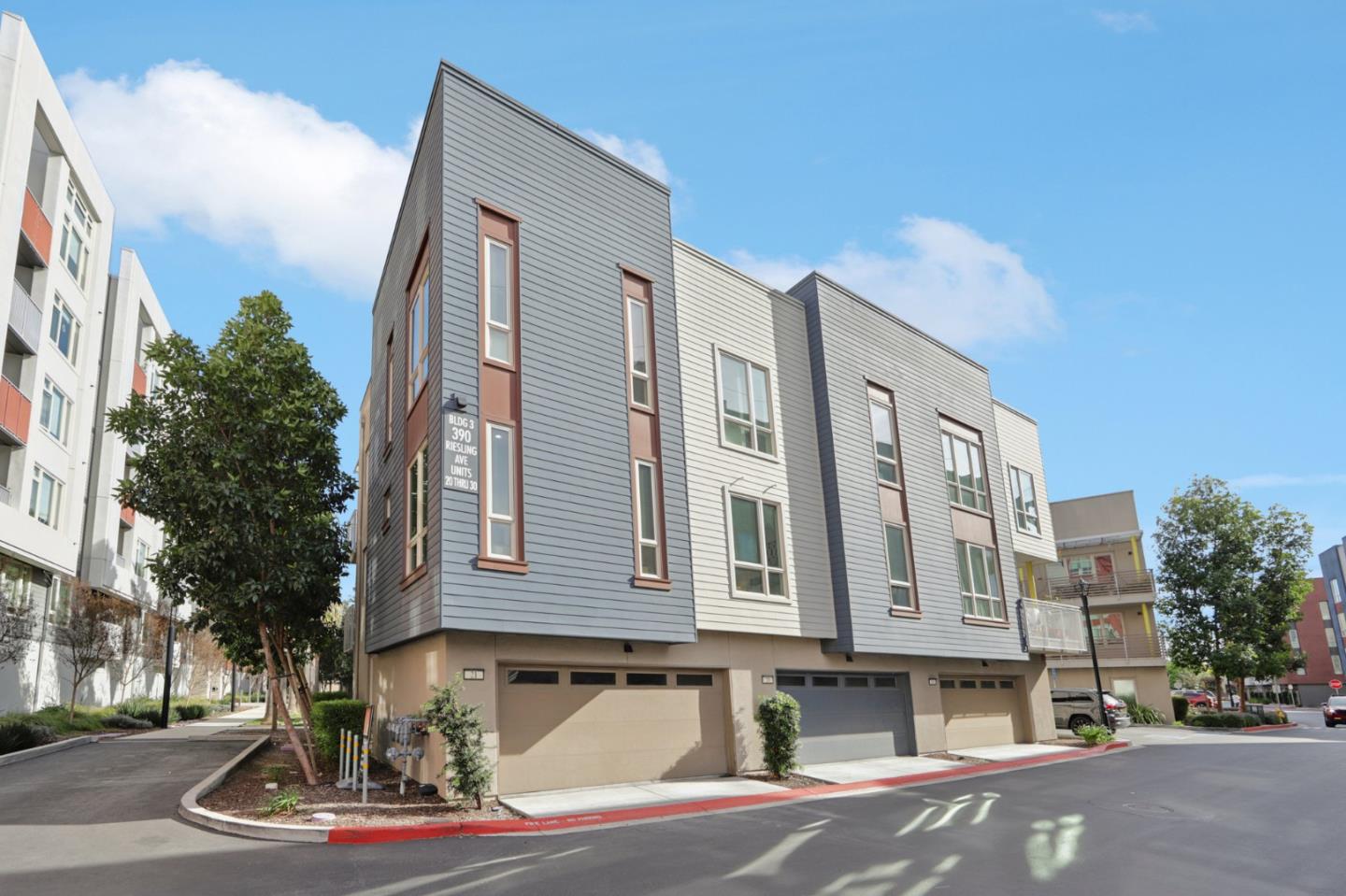 390 Riesling Avenue, Unit 21 Milpitas, CA 95035 - Photo 44 of 48 a front view of a building with street view