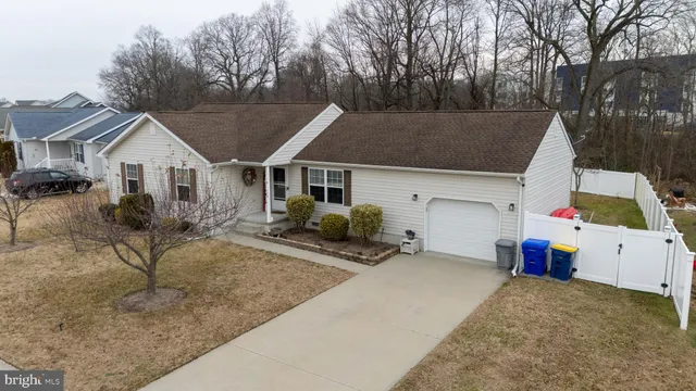 a house view with a backyard space