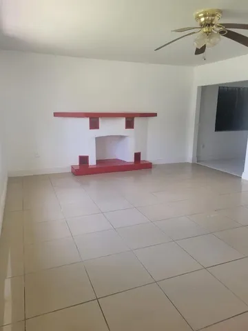 a kitchen with cabinets appliances and a counter top space