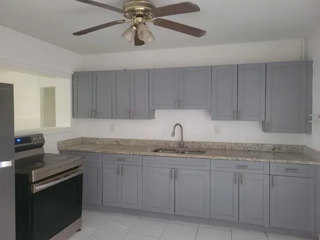 a view of cabinets and utility room