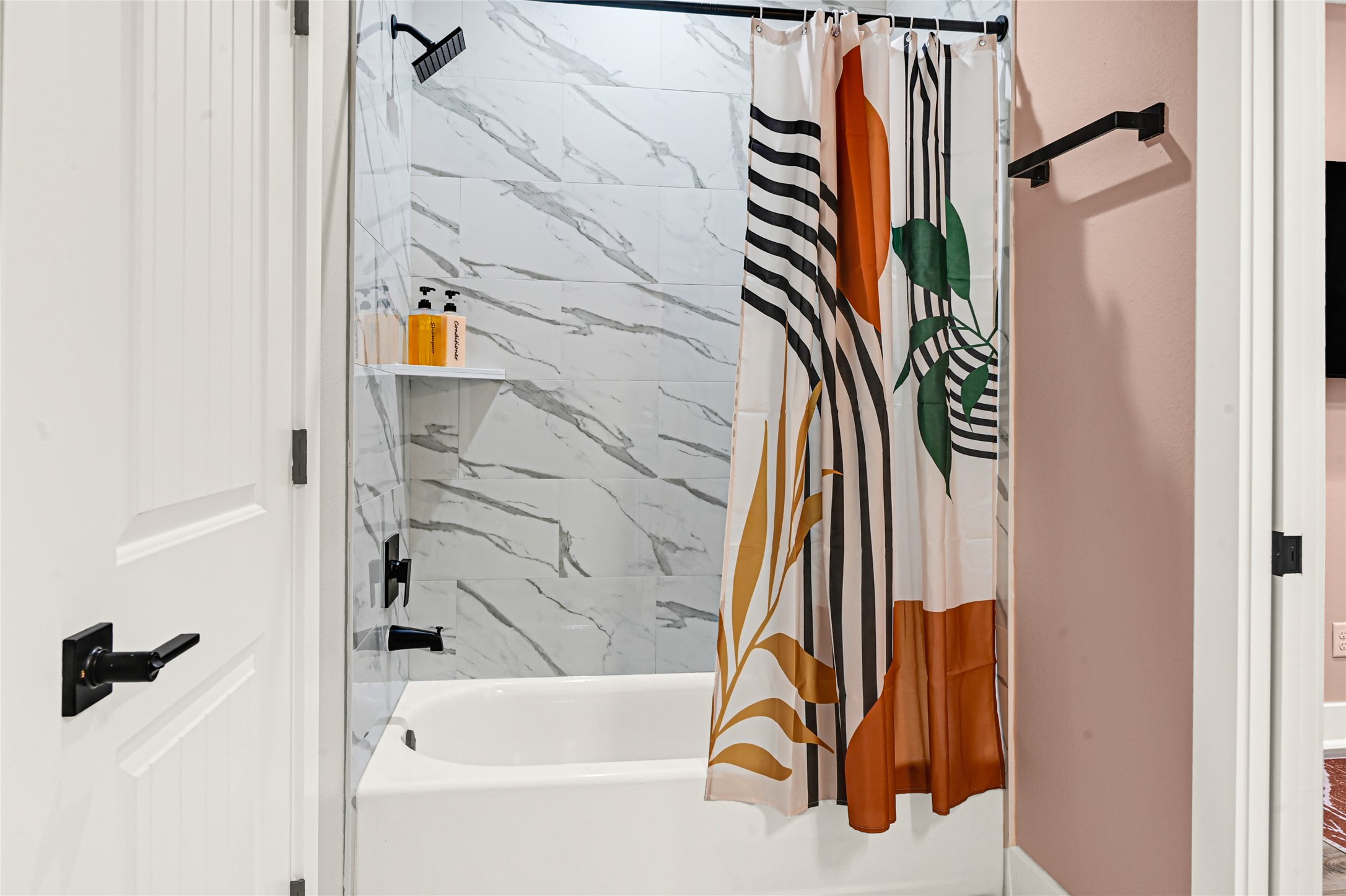 3834 Mt Pleasant Street Houston, TX 77021 - Photo 12 of 33 a bathroom with a bathtub and shower